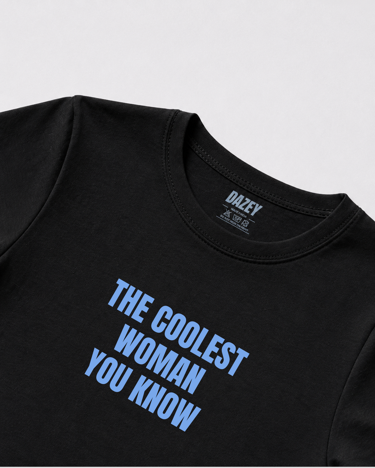 The Coolest Woman Black Baby Tee